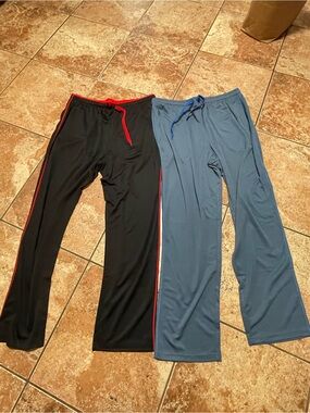 Men’s XL black and blue sweatpants with red side stripes